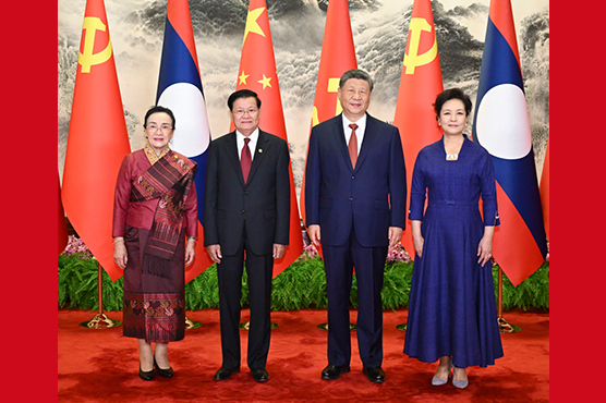 习近平同老挝人革党中央总书记、国家主席通伦会谈